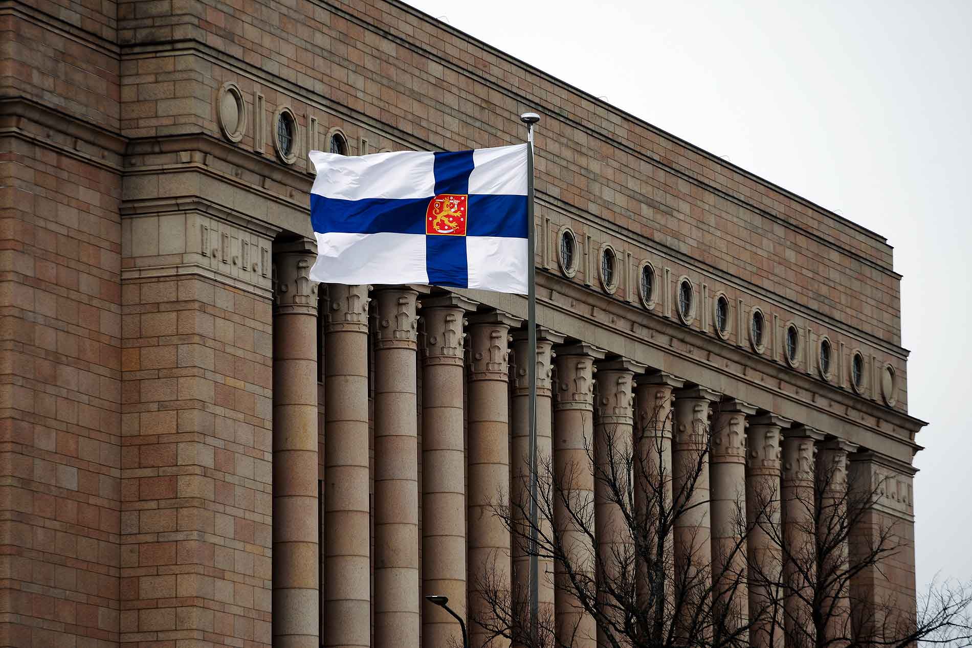 The Ministry of the Interior has instructed government agencies and institutions to display the national flag. In this image, the state flag flies in front of the Parliament Building. Archive photograph: TONY ÖHBERG/FINLAND TODAY