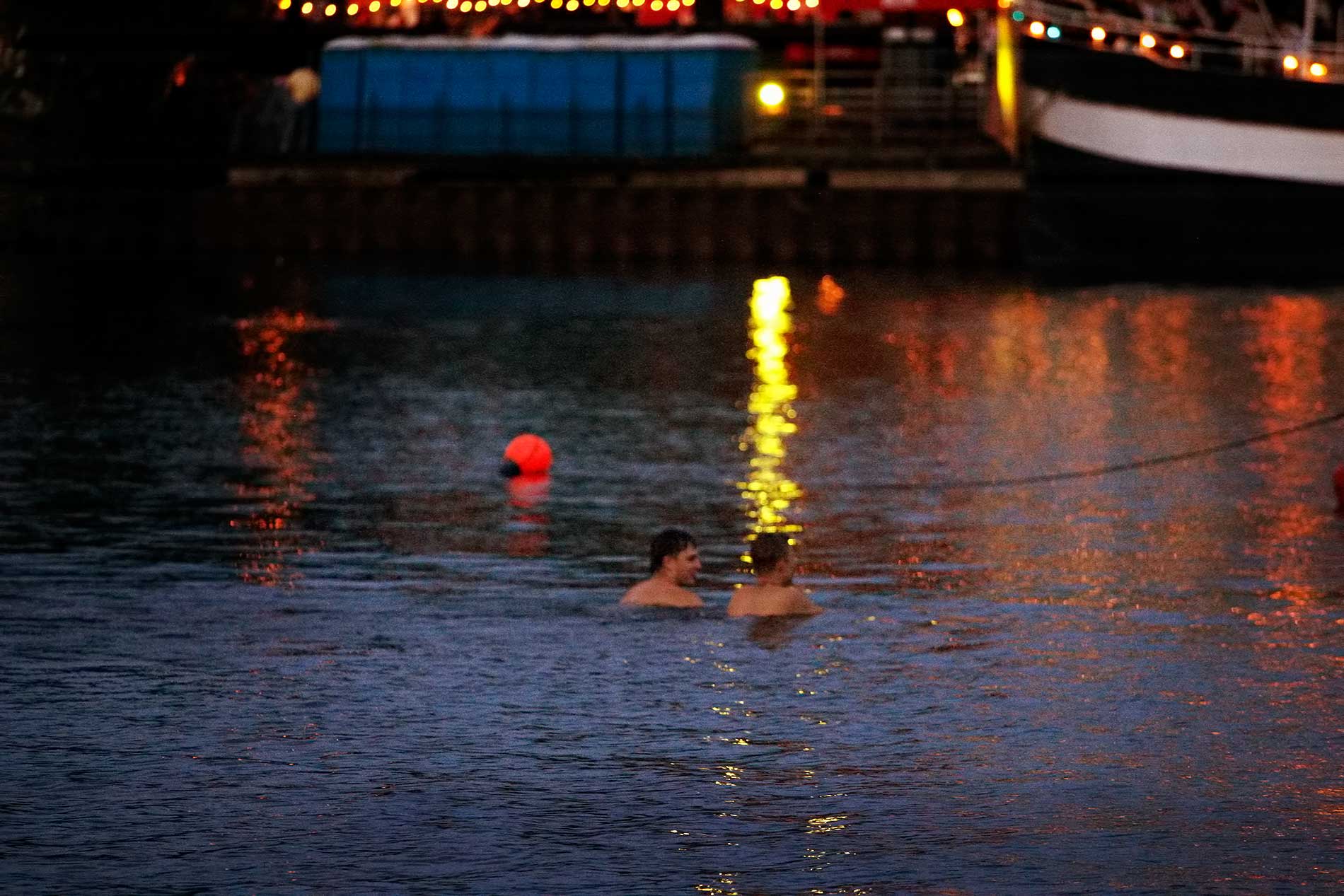 After the jazz, two boys fracture the Kokemäki River’s glassy surface, transforming city reflections into a living, breathing impressionist canvas. Photograph: TONY ÖHBERG/FINLAND TODAY