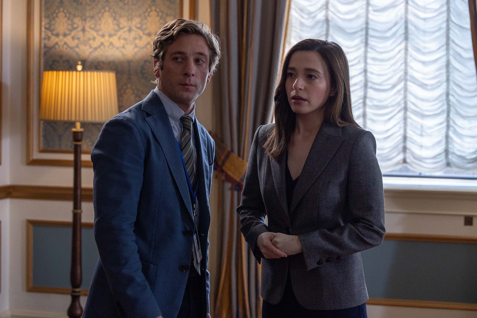 Jeff Horwitz (Jeremy Allen White) and Frances Haugen (Mikey Madison) pause together, taking in the world around them before stepping back into the storm.